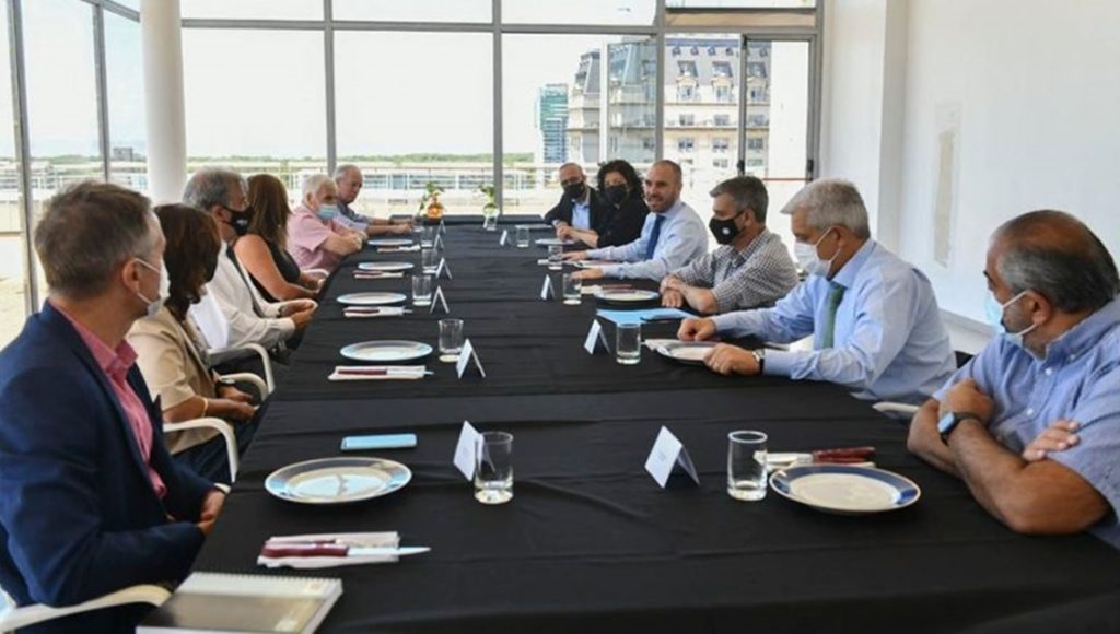 Guzmán, con empresarios y la CGT